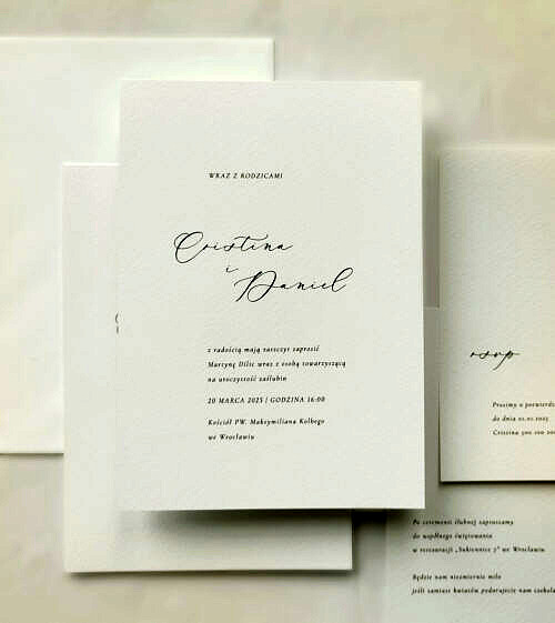 Minimalistyczne, nowoczesne, oryginalne, delikatne zaproszenia ślubne, czarno-białe z kaligrafią.