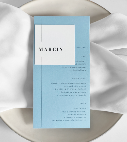 Nowoczesne, niebieskie menu z biała winietką. Stylistyka - minimalistyczne, klasyczne, leżące.
