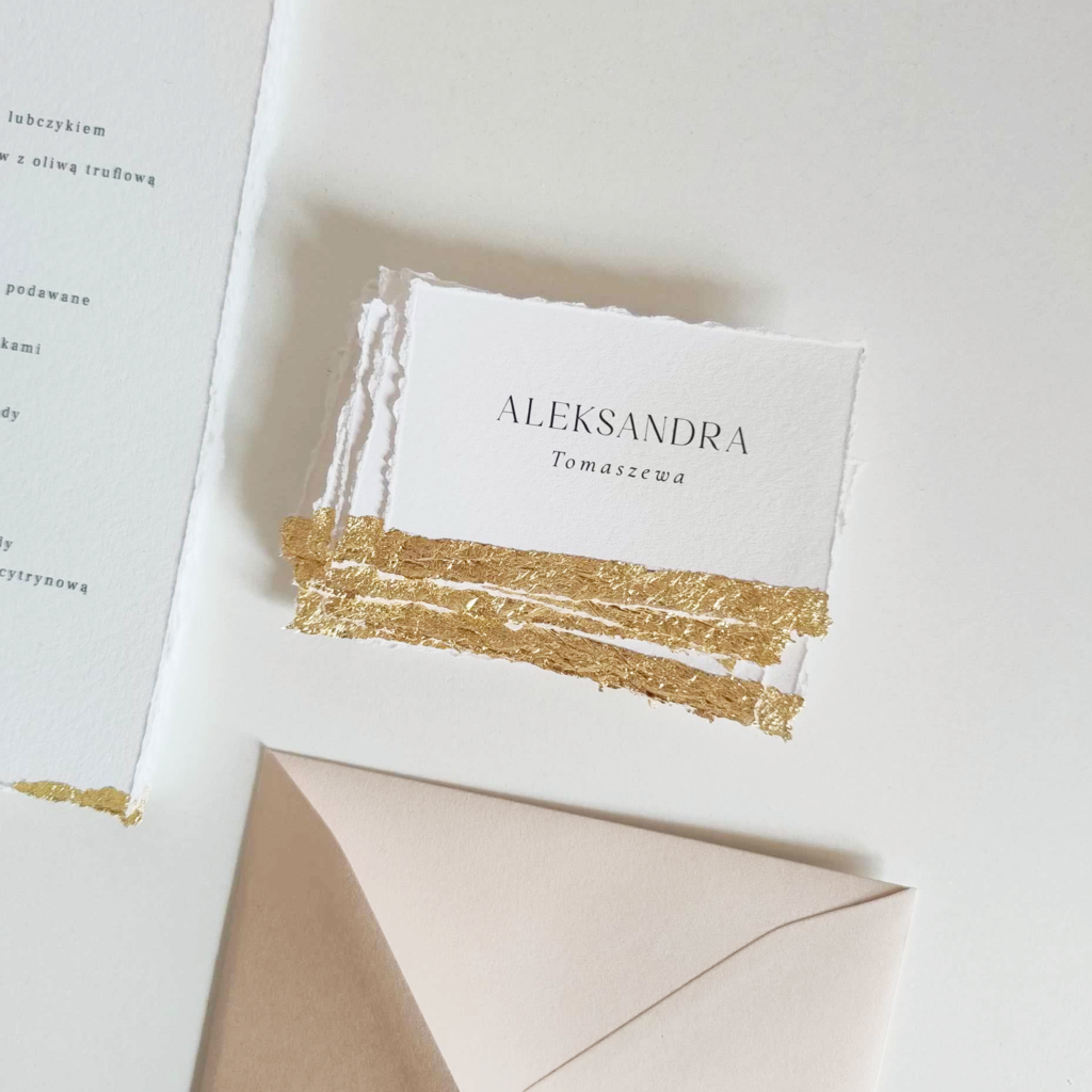 Eleganckie, luksusowe, złocone winietki ślubne. Zastosowany papier imituje papier czerpany.